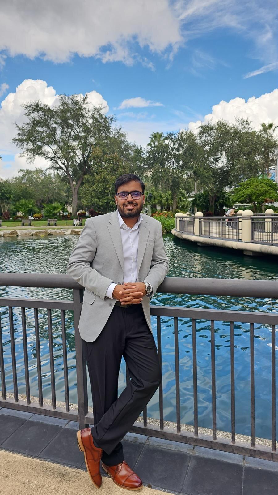 Anmol Tripathi in professional attire